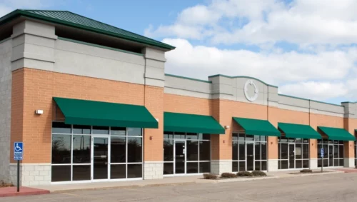 commercial area with green awning weaver al